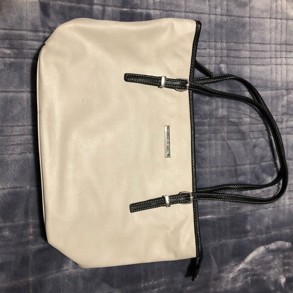 Cream and black Nine West purse.